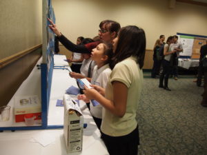 Students voting for favorite photo submissions.