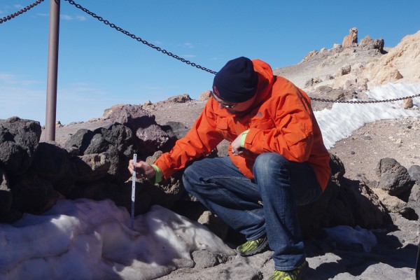 Steven Fassnacht measuring snow