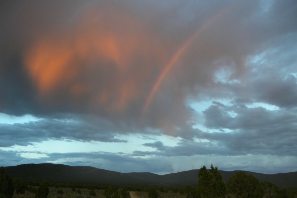 Rainbow in sunset.