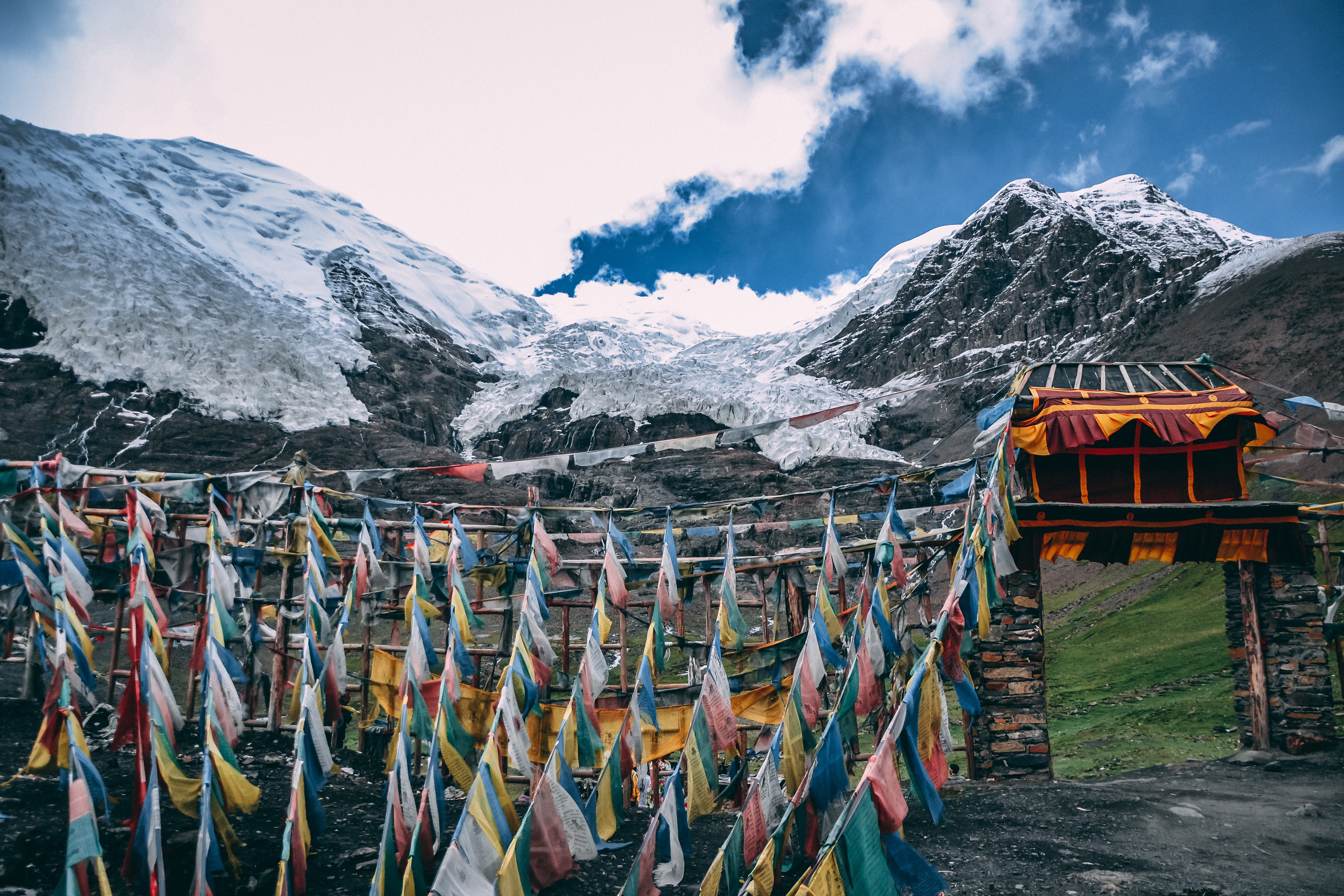 Tibetan landscape with prayer flags in foreground