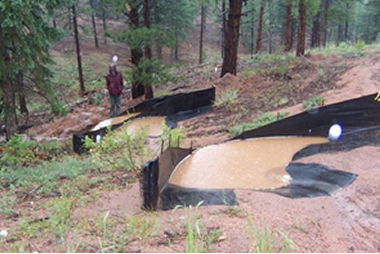 Unpaved road storm runoff sediment